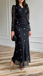 Schwarzes Maxi-Set mit blauem Blumenmuster