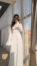Maxi dress with floral pattern and flounce sleeves